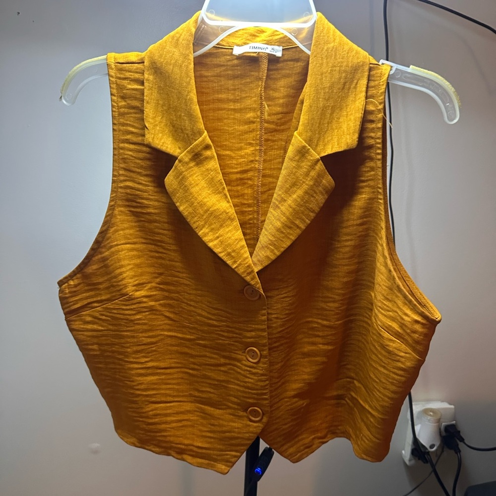 Timing Golden Sleeveless Button-Up Blouse